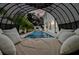 Relaxing pool view from a comfortable outdoor daybed at 4306 W Barcelona St, Tampa, FL 33629