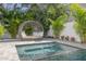 Tranquil spa and pool area with comfortable seating at 4306 W Barcelona St, Tampa, FL 33629