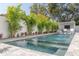 Inviting swimming pool with spacious patio and lush landscaping at 4306 W Barcelona St, Tampa, FL 33629