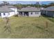 Aerial view of home with large backyard and neighboring houses at 4661 Southern Valley Loop, Brooksville, FL 34601