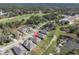 Aerial view of a house situated in a golf course community at 4661 Southern Valley Loop, Brooksville, FL 34601