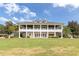 Two-story clubhouse with a large veranda and columns at 4661 Southern Valley Loop, Brooksville, FL 34601