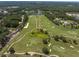 Aerial view of a beautifully landscaped golf course at 4661 Southern Valley Loop, Brooksville, FL 34601