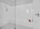 Spacious walk-in shower with a built-in bench seat at 4661 Southern Valley Loop, Brooksville, FL 34601
