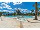 Relaxing swimming pool area with a spa and lounge chairs at 4661 Southern Valley Loop, Brooksville, FL 34601