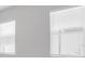 Bright room with two windows and white blinds at 4661 Southern Valley Loop, Brooksville, FL 34601
