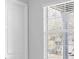 Bright room with a window featuring white blinds at 4661 Southern Valley Loop, Brooksville, FL 34601