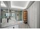 Spa-like bathroom with double vanity and walk-in shower at 4900 Brittany S Dr # 409, St Petersburg, FL 33715
