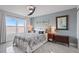 Bright bedroom with double bed and decorative artwork at 4900 Brittany S Dr # 409, St Petersburg, FL 33715