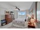 Bright bedroom with a king-size bed and water views at 4900 Brittany S Dr # 409, St Petersburg, FL 33715