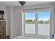 Bedroom with large windows offering water views at 4900 Brittany S Dr # 409, St Petersburg, FL 33715