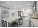 Updated kitchen featuring granite countertops and stainless steel appliances at 4900 Brittany S Dr # 409, St Petersburg, FL 33715