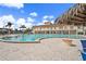 Relaxing large pool with surrounding lounge chairs at 4900 Brittany S Dr # 409, St Petersburg, FL 33715