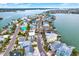 Aerial view of waterfront homes and community at 501 180Th E Ave, Redington Shores, FL 33708