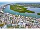 Aerial photograph showing waterfront homes and community at 501 180Th E Ave, Redington Shores, FL 33708