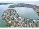 Aerial view of the home and surrounding canal-front community at 501 180Th E Ave, Redington Shores, FL 33708