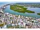 Aerial view highlighting home's waterfront location at 501 180Th E Ave, Redington Shores, FL 33708