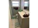 Clean bathroom with shower, toilet and vanity at 501 180Th E Ave, Redington Shores, FL 33708