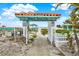 Surfsde Beach Club access with benches and picnic tables at 501 180Th E Ave, Redington Shores, FL 33708