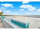 Relaxing beach view from a bench at 501 180Th E Ave, Redington Shores, FL 33708