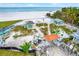 Beachfront property with gazebos and benches at 501 180Th E Ave, Redington Shores, FL 33708