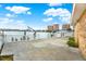 Private waterfront dock with boat lift and scenic views at 501 180Th E Ave, Redington Shores, FL 33708