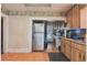 Simple kitchen with wood cabinets and appliances at 509 Rosery Nw Rd, Largo, FL 33770