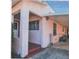 Side view of house with covered carport at 509 Rosery Nw Rd, Largo, FL 33770