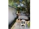 Backyard view showing a truck, some debris, and a chair at 615 Newton S Ave, St Petersburg, FL 33701