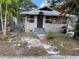 Fixer-upper home with stone exterior, needs renovation at 615 Newton S Ave, St Petersburg, FL 33701
