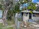 House exterior view needing renovation and landscaping at 615 Newton S Ave, St Petersburg, FL 33701