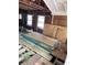 Unfinished interior showing exposed floor joists and walls at 615 Newton S Ave, St Petersburg, FL 33701