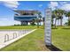 Modern waterfront pier structure with grassy areas and palm trees at 615 Newton S Ave, St Petersburg, FL 33701