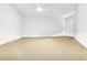 Empty bedroom with neutral walls and carpet, featuring plantation shutters and ceiling fan at 700 S Harbour Island Blvd # 226, Tampa, FL 33602