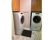 Laundry room with washer and dryer, cabinets, and tile floor at 700 S Harbour Island Blvd # 226, Tampa, FL 33602