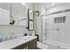 Modern bathroom with white subway tile and a tub at 809 Normandy Trace Rd, Tampa, FL 33602