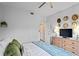 Bedroom with king bed, dresser, and TV at 809 Normandy Trace Rd, Tampa, FL 33602