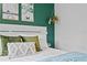 Close-up of bedroom pillows and decor at 809 Normandy Trace Rd, Tampa, FL 33602