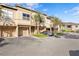 Townhouse exterior with parking and landscaping at 809 Normandy Trace Rd, Tampa, FL 33602