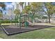 playground with playset and safety surface at 809 Normandy Trace Rd, Tampa, FL 33602