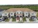Townhome community with multiple units and parking at 8126 Muddy Pines Pl, Tampa, FL 33635