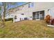 Fenced backyard with patio and AC unit at 8126 Muddy Pines Pl, Tampa, FL 33635