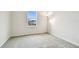 Bright bedroom with neutral walls and carpeted floor at 8126 Muddy Pines Pl, Tampa, FL 33635