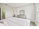 Spacious bedroom with large window and en-suite bathroom at 8126 Muddy Pines Pl, Tampa, FL 33635