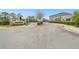 Community entrance with signage and landscaping at 8126 Muddy Pines Pl, Tampa, FL 33635