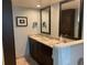 Bathroom features double sinks and granite countertop at 943 Columbia Ter, Port Charlotte, FL 33948