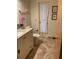 Bathroom with marble countertops and tile floor at 943 Columbia Ter, Port Charlotte, FL 33948