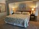 Spacious Primary bedroom with king-size bed and ample natural light at 943 Columbia Ter, Port Charlotte, FL 33948