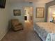 Primary bedroom with ensuite bathroom and seating area at 943 Columbia Ter, Port Charlotte, FL 33948