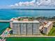 High-rise building's aerial view, offering waterfront and city views at 5200 Brittany S Dr # 1204, St Petersburg, FL 33715